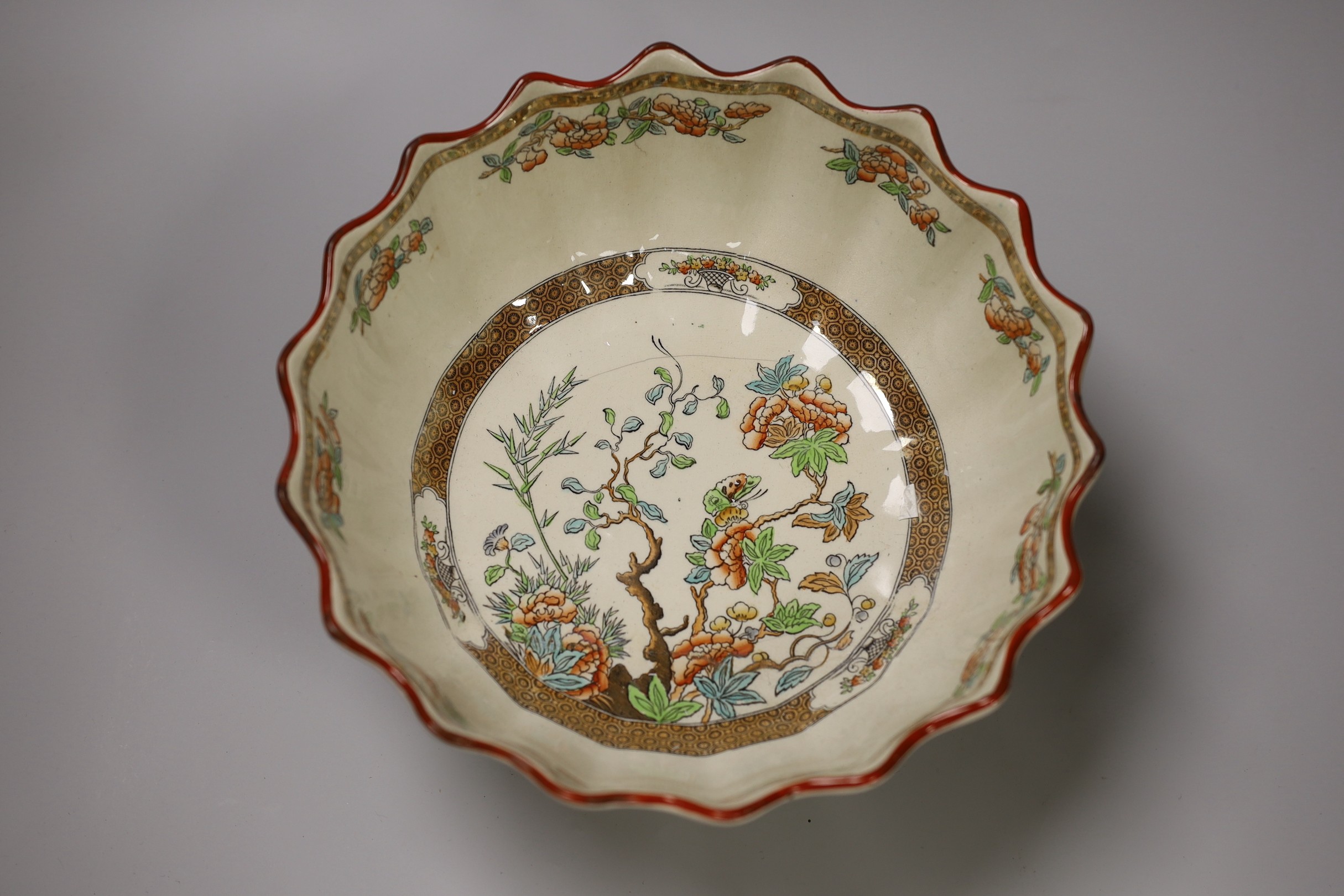 An Italian pottery 'cherub' dish and a Copeland pottery bowl